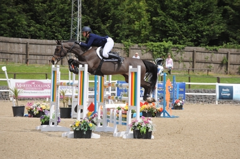 Laura Mantel seals the win in the Equitop Myoplast Senior Foxhunter Second Round at Wales and West Showground